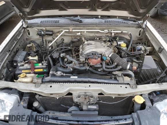 2003 Nissan Frontier XE with VIN 1N6ED29X03C445019, listed as a Copart auction lot 45687565 with 191,290 mi miles and Salvage title. Bid and sale history available at DreamBid. Image 11.