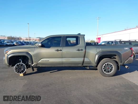 2024 Toyota Tacoma SR5 with VIN 3TMLB5JN6RM048448, listed as a IAAI auction lot 41005722 with 1,562 mi miles and . Bid and sale history available at DreamBid. Image 15.