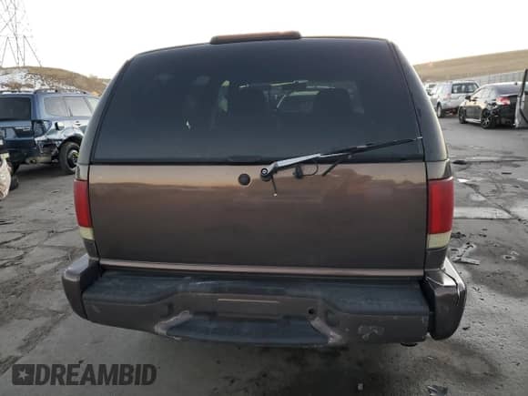 2000 Chevrolet Blazer LS z VIN 1GNCS13W7YK218263, wystawiony jako Copart lot #80774144 z przebiegiem 76 764 mil mil oraz Szkoda całkowita • Salvage title. Historia ofert i sprzedaży dostępna na DreamBid. Obrazek 6.