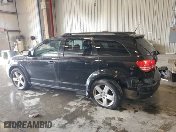 2010 Dodge Journey SXT with VIN 3D4PG5FV5AT104873, listed as a Copart auction lot 81435845 with 147,170 mi miles and Non repairable. Bid and sale history available at DreamBid. Image 2.