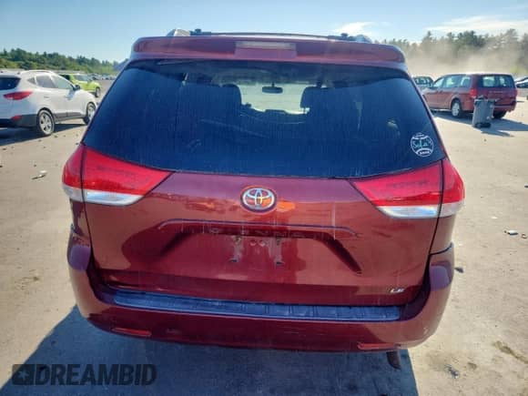2012 Toyota Sienna LE AAS with VIN 5TDKK3DC9CS279054, listed as a Copart auction lot 69786185 with 182,625 mi miles and Salvage title. Bid and sale history available at DreamBid. Image 6.
