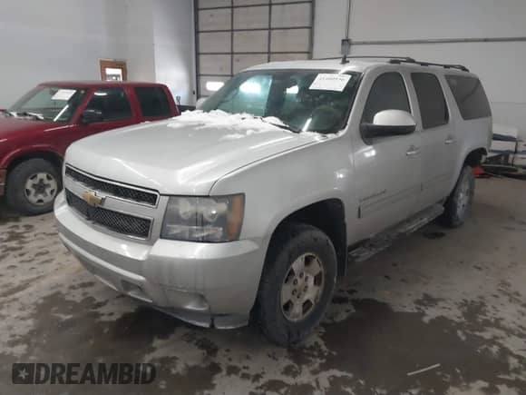 2011 Chevrolet Suburban LS z VIN 1GNSKHE35BR195779, wystawiony jako IAAI lot #41600936 z przebiegiem 155 109 mil mil oraz . Historia ofert i sprzedaży dostępna na DreamBid. Obrazek 17.
