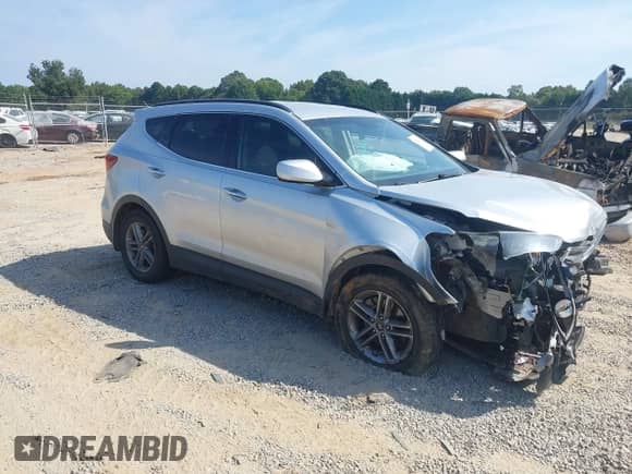 2017 Hyundai Santa Fe 2.4L with VIN 5XYZU3LB2HG430161, listed as a IAAI auction lot 43272663 with 156,711 mi miles and . Bid and sale history available at DreamBid. Image 1.