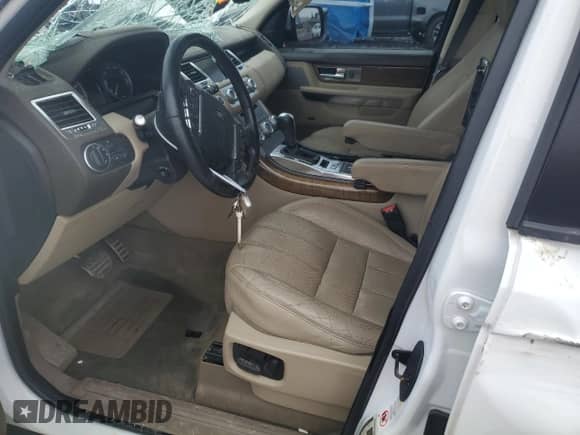 2013 Land Rover Range Rover Sport SC with VIN SALSH2E48DA803737, listed as a Copart auction lot 50303275 with 127,712 mi miles and Salvage title. Bid and sale history available at DreamBid. Image 7.