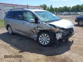 2014 Toyota Sienna LE z VIN 5TDJK3DC2ES092852, wystawiony jako IAAI lot #43026331 z przebiegiem 80 100 mil mil oraz . Historia ofert i sprzedaży dostępna na DreamBid. Obrazek 1.