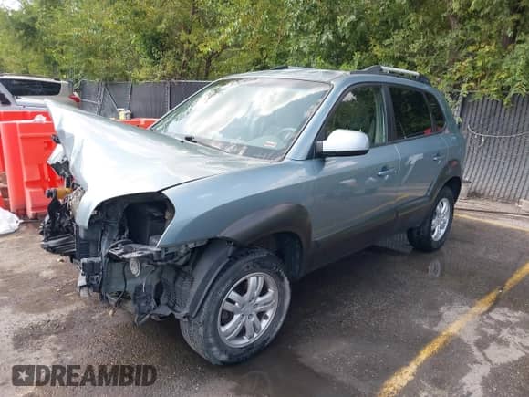 2007 Hyundai Tucson SE z VIN KM8JN72D87U574309, wystawiony jako IAAI lot #40311967 z przebiegiem 165 797 mil mil oraz . Historia ofert i sprzedaży dostępna na DreamBid. Obrazek 2.