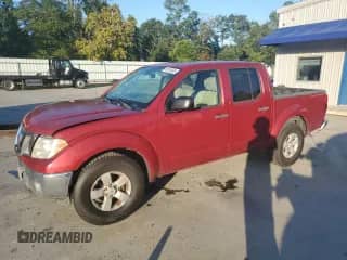 2011 Nissan Frontier SV with VIN 1N6AD0ER0BC423904, listed as a Copart auction lot 80184935 with 132,666 mi miles and Salvage title. Bid and sale history available at DreamBid. Image 1.