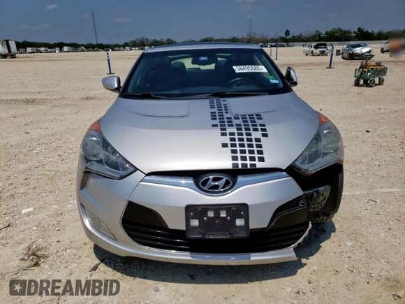 2013 Hyundai Veloster w/Black Int z VIN KMHTC6AD9DU147646, wystawiony jako Copart lot #58495585 z przebiegiem 121 781 mil mil oraz Szkoda całkowita • Salvage title. Historia ofert i sprzedaży dostępna na DreamBid. Obrazek 5.