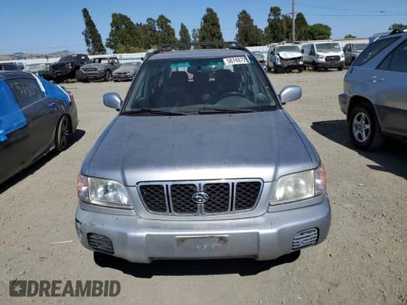 2002 Subaru Forester S with VIN JF1SF65612H743803, listed as a Copart auction lot 58748725 with 67,381 mi miles and Clean title. Bid and sale history available at DreamBid. Image 5.