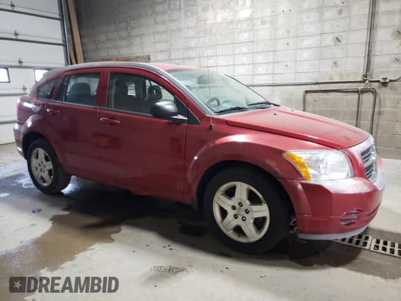 2009 Dodge Caliber SXT with VIN 1B3HB48A39D183841, listed as a Copart auction lot 84930845 with 199,267 mi miles and Clean title. Bid and sale history available at DreamBid. Image 4.