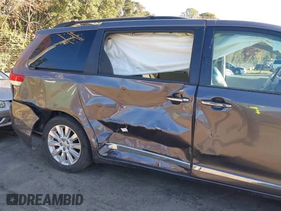 2013 Toyota Sienna XLE AAS with VIN 5TDYK3DC4DS338782, listed as a IAAI auction lot 40951306 with 149,428 mi miles and . Bid and sale history available at DreamBid. Image 6.