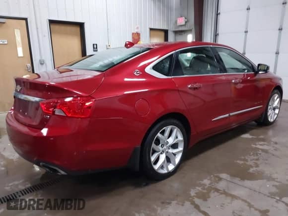2014 Chevrolet Impala LTZ with VIN 1G1145SL2EU100560, listed as a IAAI auction lot 42278585 with 216,097 mi miles and . Bid and sale history available at DreamBid. Image 4.