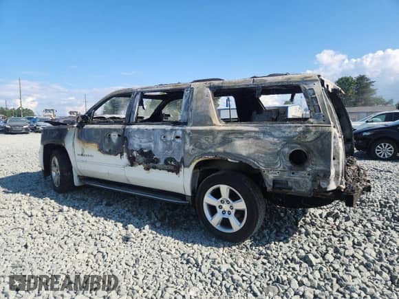 2015 Chevrolet Suburban LTZ с VIN 1GNSKKKC4FR224017, выставлен на аукционе Copart как лот 70117895 с пробегом Не указан миль и Списание • Salvage title. История ставок и продаж доступна на DreamBid. Изображение 2.