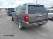 2014 Chevrolet Tahoe LS with VIN 1GNSCAE01ER248914, listed as a IAAI auction lot 42536400 with 105,452 mi miles and . Bid and sale history available at DreamBid. Image 3.