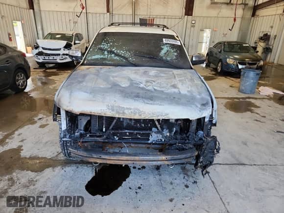 2014 Chevrolet Suburban LTZ with VIN 1GNSKKE72ER152456, listed as a Copart auction lot 69933495 with Not provided miles and Non repairable. Bid and sale history available at DreamBid. Image 9.