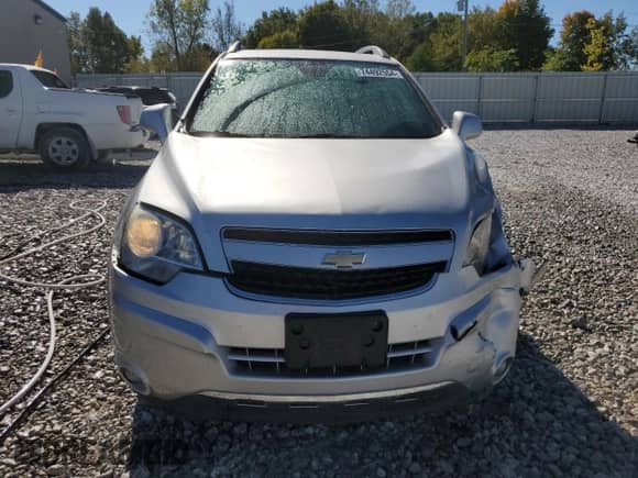 2012 Chevrolet Captiva Sport LTZ z VIN 3GNFL4E56CS594174, wystawiony jako Copart lot #74492554 z przebiegiem 129 625 mil mil oraz Czysty tytuł • Clean title. Historia ofert i sprzedaży dostępna na DreamBid. Obrazek 5.