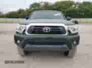 2014 Toyota Tacoma с VIN 3TMLU4EN2EM149995, выставлен на аукционе Copart как лот 84303675 с пробегом 119 960 миль миль и Списание • Salvage title. История ставок и продаж доступна на DreamBid. Изображение 5.
