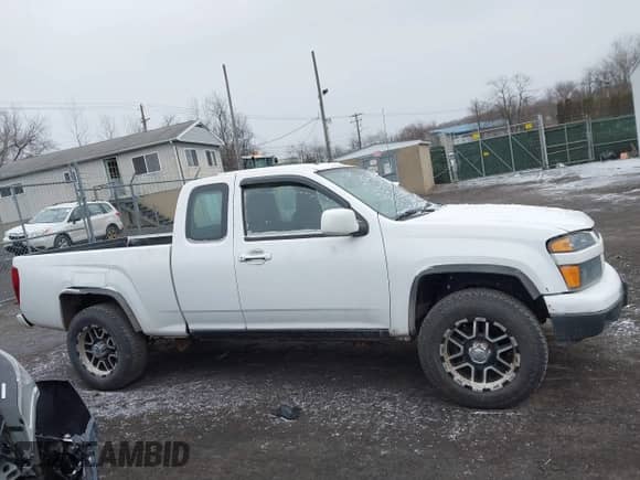2012 Chevrolet Colorado Work Truck с VIN 1GCJTBFE0C8121904, выставлен на аукционе IAAI как лот 41638532 с пробегом 148 370 миль миль и . История ставок и продаж доступна на DreamBid. Изображение 13.