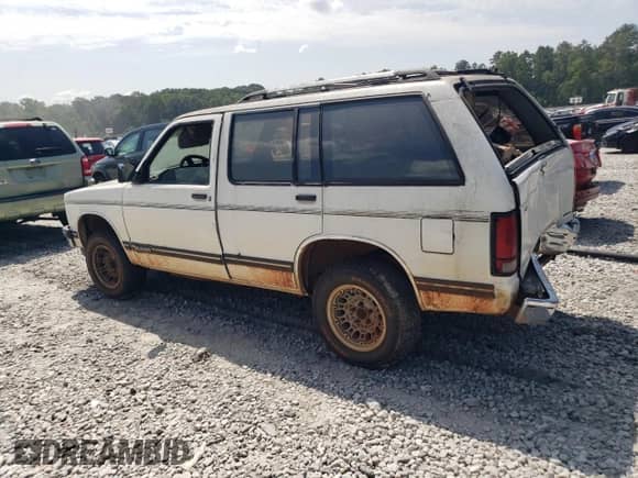 1993 Chevrolet Blazer LS с VIN 1GNCS13W7P2144096, выставлен на аукционе Copart как лот 66123774 с пробегом Не указан миль и Списание • Salvage title. История ставок и продаж доступна на DreamBid. Изображение 2.