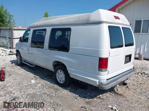 2004 Ford Econoline Cargo with VIN 1FTNS24WX4HA92137, listed as a IAAI auction lot 42888080 with 158,035 mi miles and . Bid and sale history available at DreamBid. Image 3.