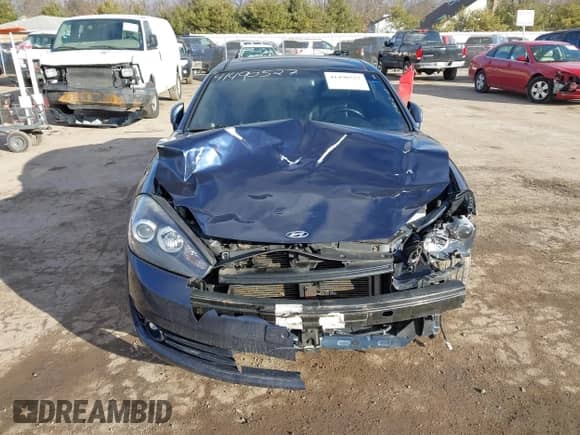 2008 Hyundai Tiburon GT with VIN KMHHN66F88U278938, listed as a IAAI auction lot 41490527 with 200,669 mi miles and . Bid and sale history available at DreamBid. Image 12.