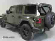 2021 Jeep Wrangler Unlimited Sahara Altitude z VIN 1C4HJXEM0MW655802, wystawiony jako Copart lot #65413235 z przebiegiem 48 130 mil mil oraz Szkoda całkowita • Salvage title. Historia ofert i sprzedaży dostępna na DreamBid. Obrazek 4.