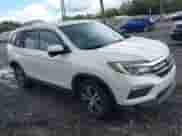 2018 Honda Pilot EX-L with VIN 5FNYF5H69JB013789, listed as a IAAI auction lot 43318645 with 130,249 mi miles and . Bid and sale history available at DreamBid. Image 1.