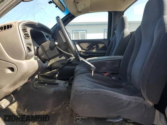 2000 Dodge Dakota с VIN 1B7FL26X1YS753294, выставлен на аукционе Copart как лот 70055785 с пробегом Не указан миль и Чистый • Clean title. История ставок и продаж доступна на DreamBid. Изображение 7.