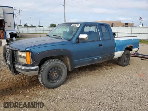 1991 GMC Sierra 1500 SLT z VIN 2GTEK19Z4M1542137, wystawiony jako Copart lot #68024074 z przebiegiem 347 281 mil mil oraz Szkoda całkowita • Salvage title. Historia ofert i sprzedaży dostępna na DreamBid. Obrazek 1.