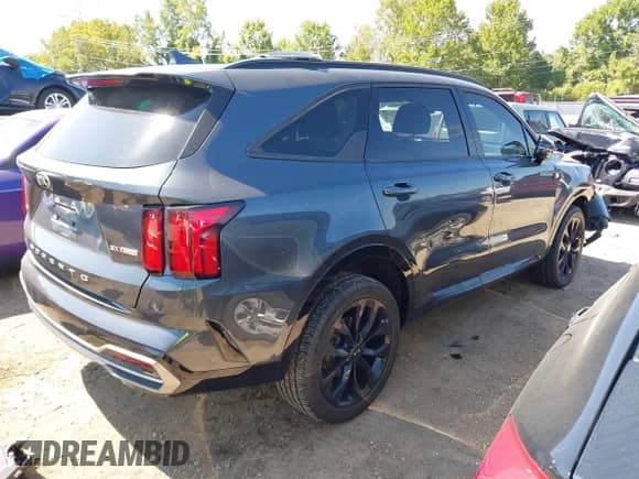 2021 Kia Sorento SX Prestige X-Line with VIN 5XYRKDLF7MG041220, listed as a IAAI auction lot 43172566 with 65,036 mi miles and . Bid and sale history available at DreamBid. Image 4.