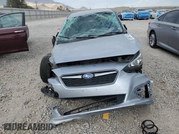 2018 Subaru Impreza z VIN 4S3GKAA62J3604568, wystawiony jako Copart lot #69947105 z przebiegiem Nie podano mil oraz Szkoda całkowita • Salvage title. Historia ofert i sprzedaży dostępna na DreamBid. Obrazek 5.