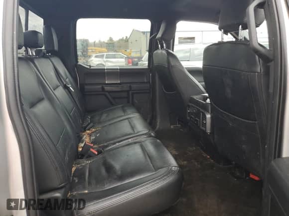 2018 Ford F-150 XLT z VIN 1FTEW1EG5JFA84380, wystawiony jako Copart lot #54830565 z przebiegiem 141 764 mil mil oraz Szkoda całkowita • Salvage title. Historia ofert i sprzedaży dostępna na DreamBid. Obrazek 10.