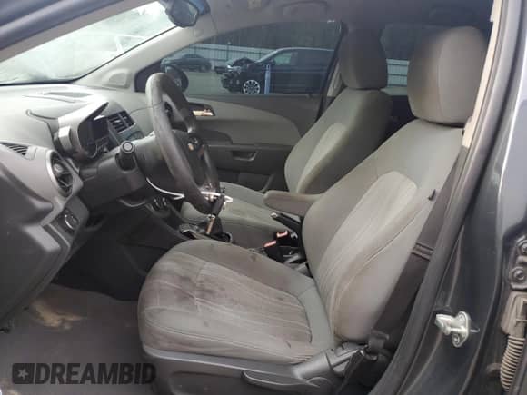 2012 Chevrolet Sonic LT z VIN 1G1JD5SB5C4218560, wystawiony jako Copart lot #75256184 z przebiegiem 182 339 mil mil oraz Szkoda całkowita • Salvage title. Historia ofert i sprzedaży dostępna na DreamBid. Obrazek 7.