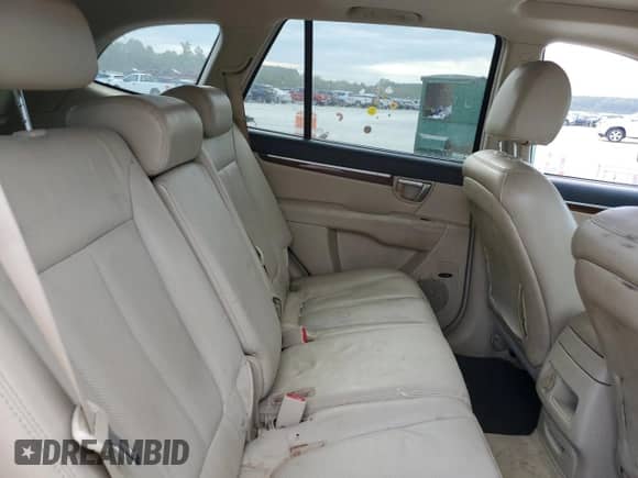 2009 Hyundai Santa Fe Limited с VIN 5NMSH13E09H321466, выставлен на аукционе Copart как лот 71076945 с пробегом 186 992 миль миль и Списание • Salvage title. История ставок и продаж доступна на DreamBid. Изображение 11.