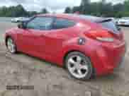 2013 Hyundai Veloster w/Black Int z VIN KMHTC6AD5DU173242, wystawiony jako Copart lot #54733125 z przebiegiem 157 766 mil mil oraz Czysty tytuł • Clean title. Historia ofert i sprzedaży dostępna na DreamBid. Obrazek 2.