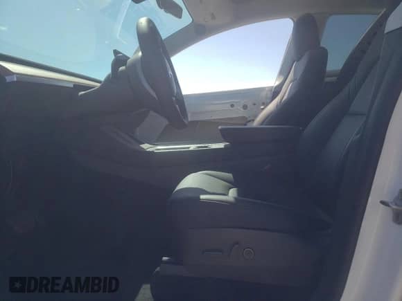 2023 Tesla Model Y Long Range с VIN 7SAYGDEE2PF662932, выставлен на аукционе Copart как лот 66630524 с пробегом 20 221 миль миль и Списание • Salvage title. История ставок и продаж доступна на DreamBid. Изображение 7.
