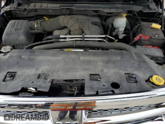 2012 Ram 1500 Laramie z VIN 1C6RD7JT7CS265107, wystawiony jako Copart lot #69794895 z przebiegiem 161 013 mil mil oraz Szkoda całkowita • Salvage title. Historia ofert i sprzedaży dostępna na DreamBid. Obrazek 11.