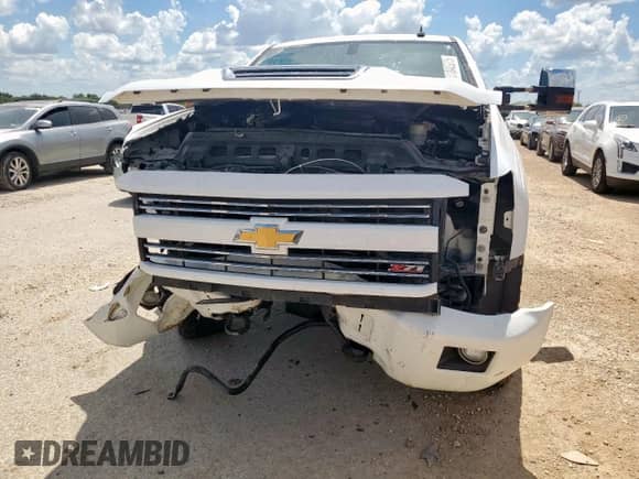 2017 Chevrolet Silverado 2500HD LTZ с VIN 1GC1KWEY7HF165262, выставлен на аукционе Copart как лот 61842975 с пробегом Не указан миль и Списание • Salvage title. История ставок и продаж доступна на DreamBid. Изображение 5.