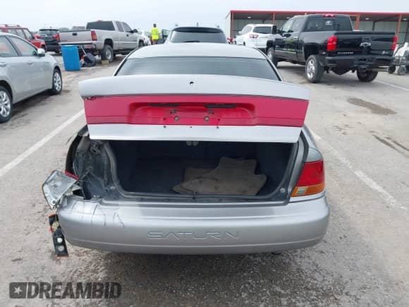 1997 Saturn SL с VIN 1G8ZK527XVZ257477, выставлен на аукционе IAAI как лот 42029648 с пробегом 114 371 миль миль и . История ставок и продаж доступна на DreamBid. Изображение 16.