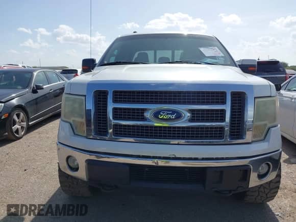 2011 Ford F-150 XLT z VIN 1FTFW1ET7BKE16359, wystawiony jako IAAI lot #42752981 z przebiegiem 197 969 mil mil oraz . Historia ofert i sprzedaży dostępna na DreamBid. Obrazek 12.