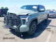 2024 Toyota Tundra SR5 with VIN 5TFLA5ECXRX035045, listed as a IAAI auction lot 42762521 with 23,439 mi miles and . Bid and sale history available at DreamBid. Image 2.