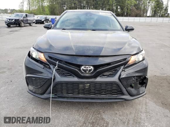 2021 Toyota Camry SE z VIN 4T1S11AK1MU439696, wystawiony jako Copart lot #51130945 z przebiegiem 74 525 mil mil oraz Szkoda całkowita • Salvage title. Historia ofert i sprzedaży dostępna na DreamBid. Obrazek 5.
