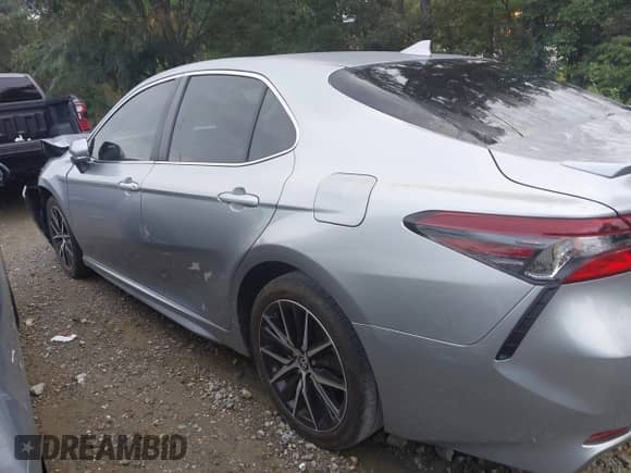 2023 Toyota Camry SE z VIN 4T1G11AK2PU829555, wystawiony jako IAAI lot #43047642 z przebiegiem 25 983 mil mil oraz . Historia ofert i sprzedaży dostępna na DreamBid. Obrazek 14.