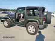 2007 Jeep Wrangler Sahara z VIN 1J8FA54107L153759, wystawiony jako Copart lot #61725475 z przebiegiem Nie podano mil oraz Szkoda całkowita • Salvage title. Historia ofert i sprzedaży dostępna na DreamBid. Obrazek 2.