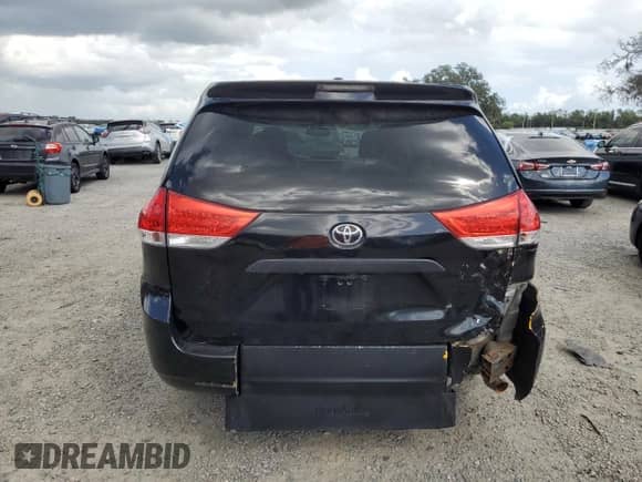 2014 Toyota Sienna L with VIN 5TDZK3DCXES461170, listed as a Copart auction lot 82210975 with 211,086 mi miles and Salvage title. Bid and sale history available at DreamBid. Image 6.