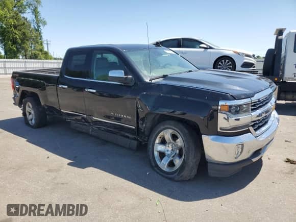 2017 Chevrolet Silverado 1500 LTZ with VIN 1GCVKSEC0HZ203430, listed as a Copart auction lot 53019305 with 101,690 mi miles and Salvage title. Bid and sale history available at DreamBid. Image 4.