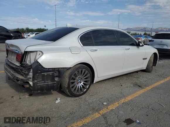 2013 BMW 7 Series 740Li with VIN WBAYE4C5XDDW22670, listed as a Copart auction lot 69883835 with 154,183 mi miles and Salvage title. Bid and sale history available at DreamBid. Image 3.