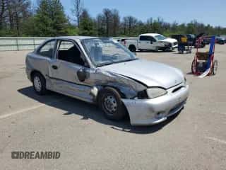 1999 Hyundai Accent L with VIN KMHVD14N9XU497814, listed as a Copart auction lot 60374665 with 287,585 mi miles and Salvage title. Bid and sale history available at DreamBid. Image 4.