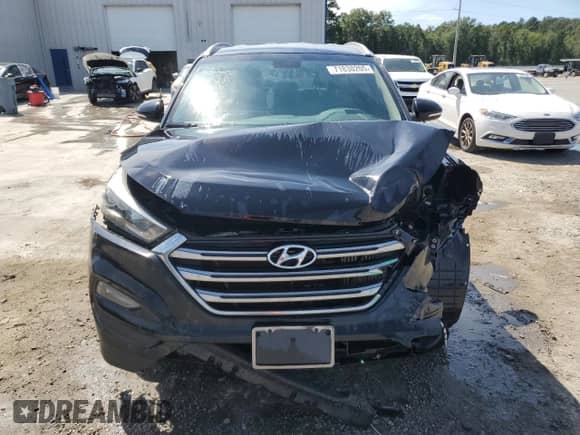 2018 Hyundai Tucson Value with VIN KM8J33A27JU745640, listed as a Copart auction lot 71830205 with 118,965 mi miles and Salvage title. Bid and sale history available at DreamBid. Image 5.