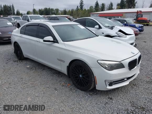 2013 BMW 7 Series 740Li with VIN WBAYE4C57DD136902, listed as a IAAI auction lot 43210485 with 70,724 mi miles and . Bid and sale history available at DreamBid. Image 1.